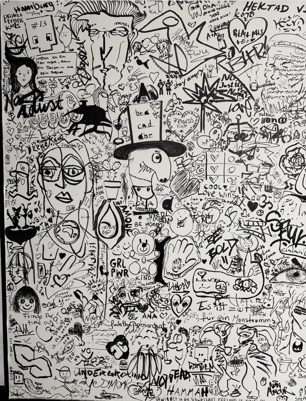 Wall filled with collective artwork